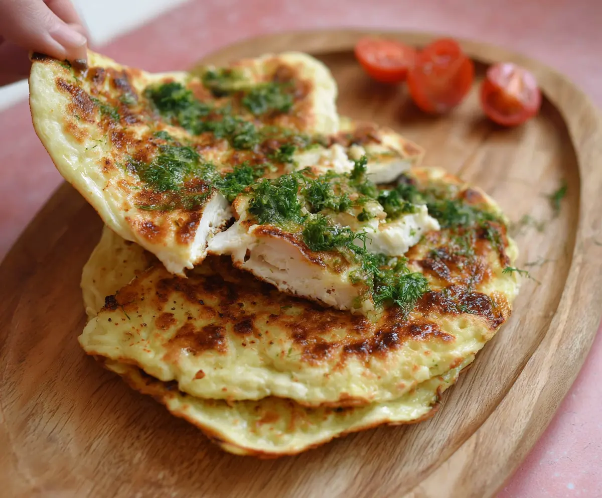 Delicious homemade cottage cheese flatbread topped with herbs and spices.