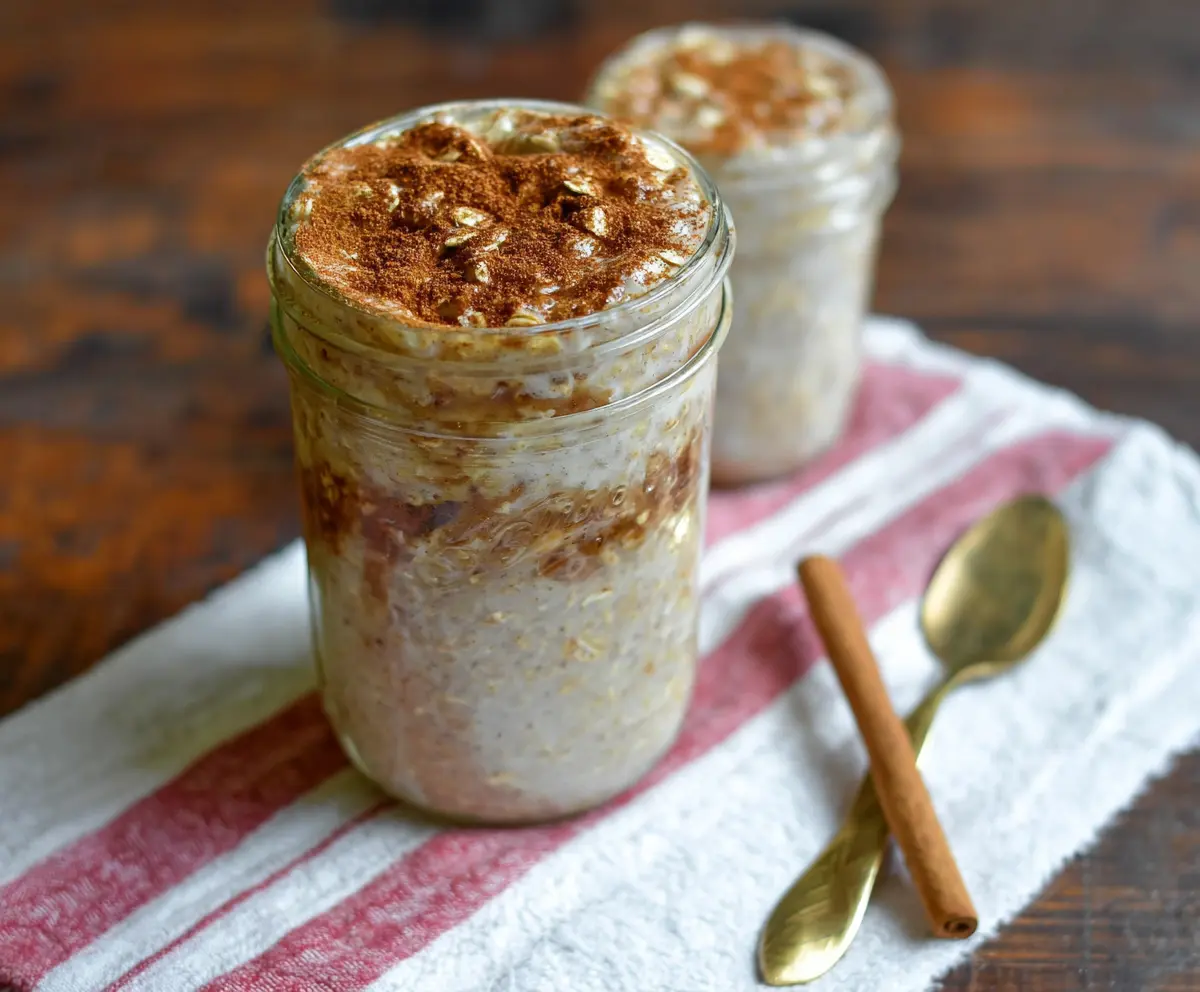 Creamy Snickerdoodle Overnight Oats topped with cinnamon sugar for a delicious breakfast treat.
